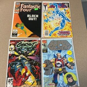 Marvel Comic Book Set with Red, Blue, and Yellow Covers